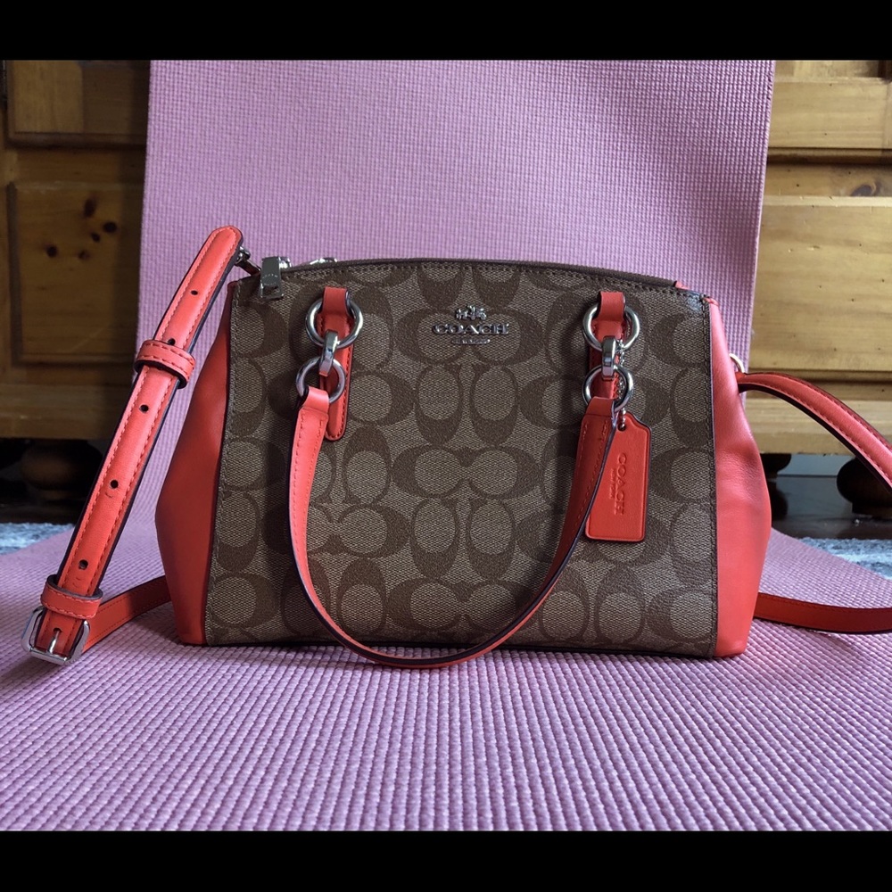 Tan and orange Coach bag.  Cross body or tote.